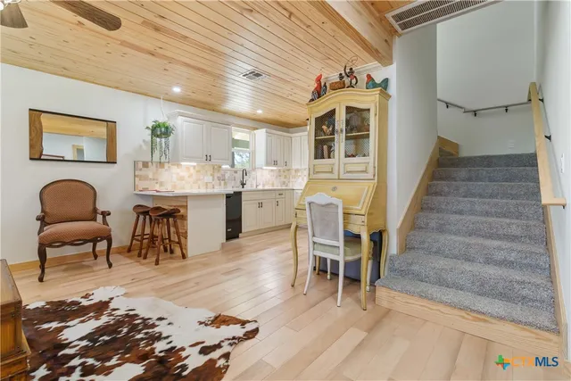 a bathroom with a sink a toilet and a bathtub