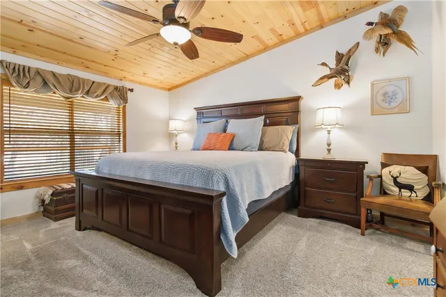 a bathroom with a sink vanity and a mirror