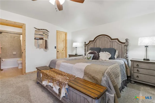 a view of parking garage with cars and other equipment