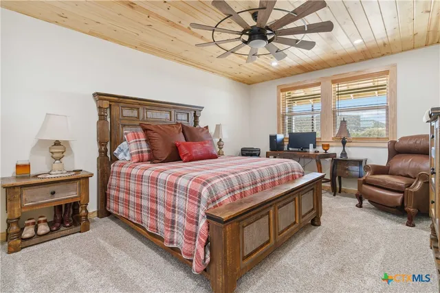 a view of a porch with wooden floor and outdoor space