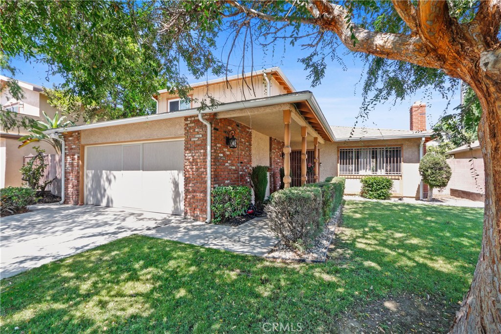 331 East Cassidy Street Carson, CA 90746 - Photo 1 of 1 a front view of a house with garden