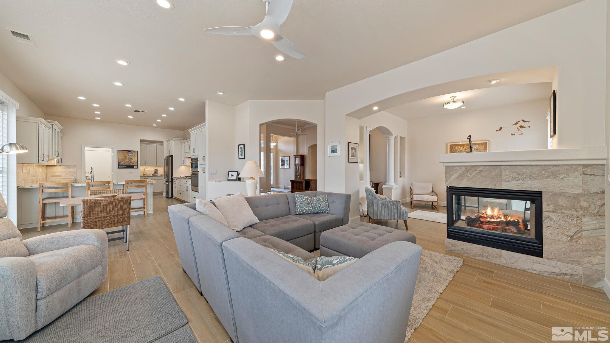 2085 Tesuque Court Reno, NV 89511 - Photo 13 of 40 a living room with furniture and a fireplace