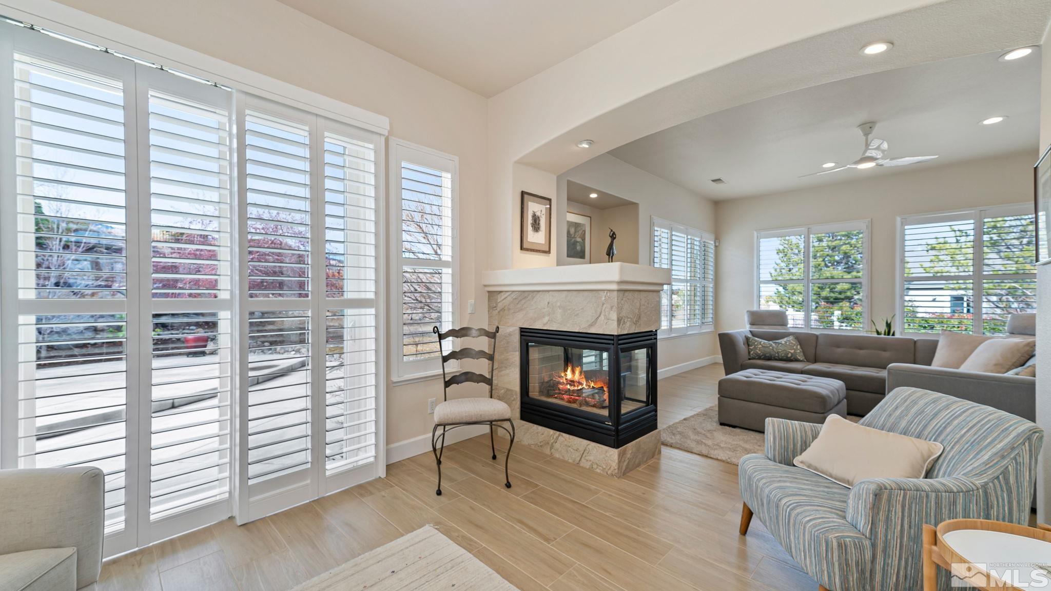 2085 Tesuque Court Reno, NV 89511 - Photo 14 of 40 a living room with furniture and a fireplace