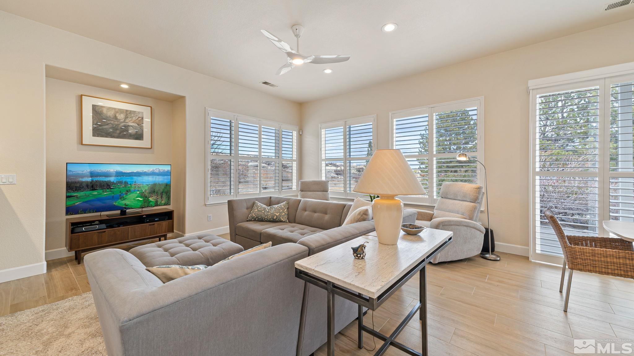 2085 Tesuque Court Reno, NV 89511 - Photo 15 of 40 a living room with furniture and a flat screen tv