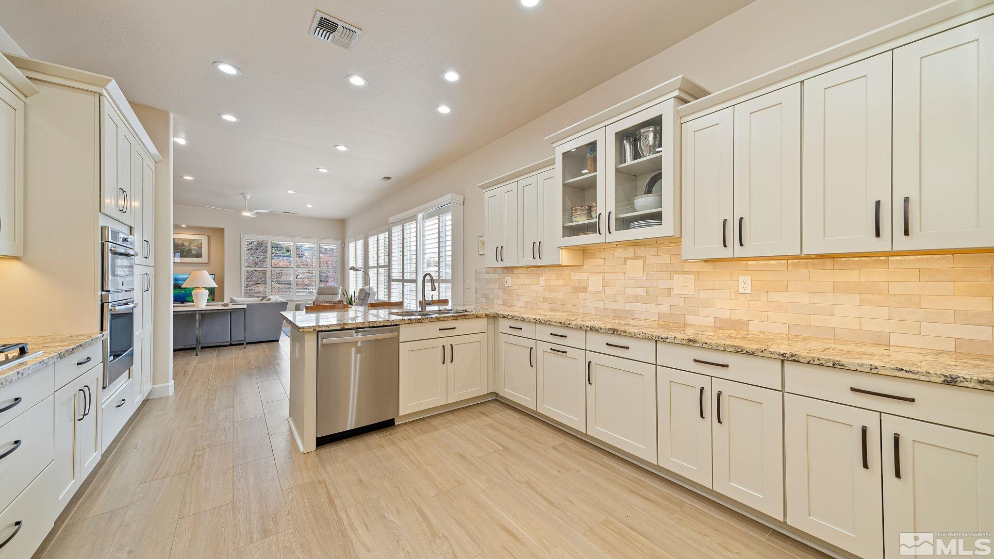 2085 Tesuque Court Reno, NV 89511 - Photo 21 of 40 a large kitchen with granite countertop lots of counter top space