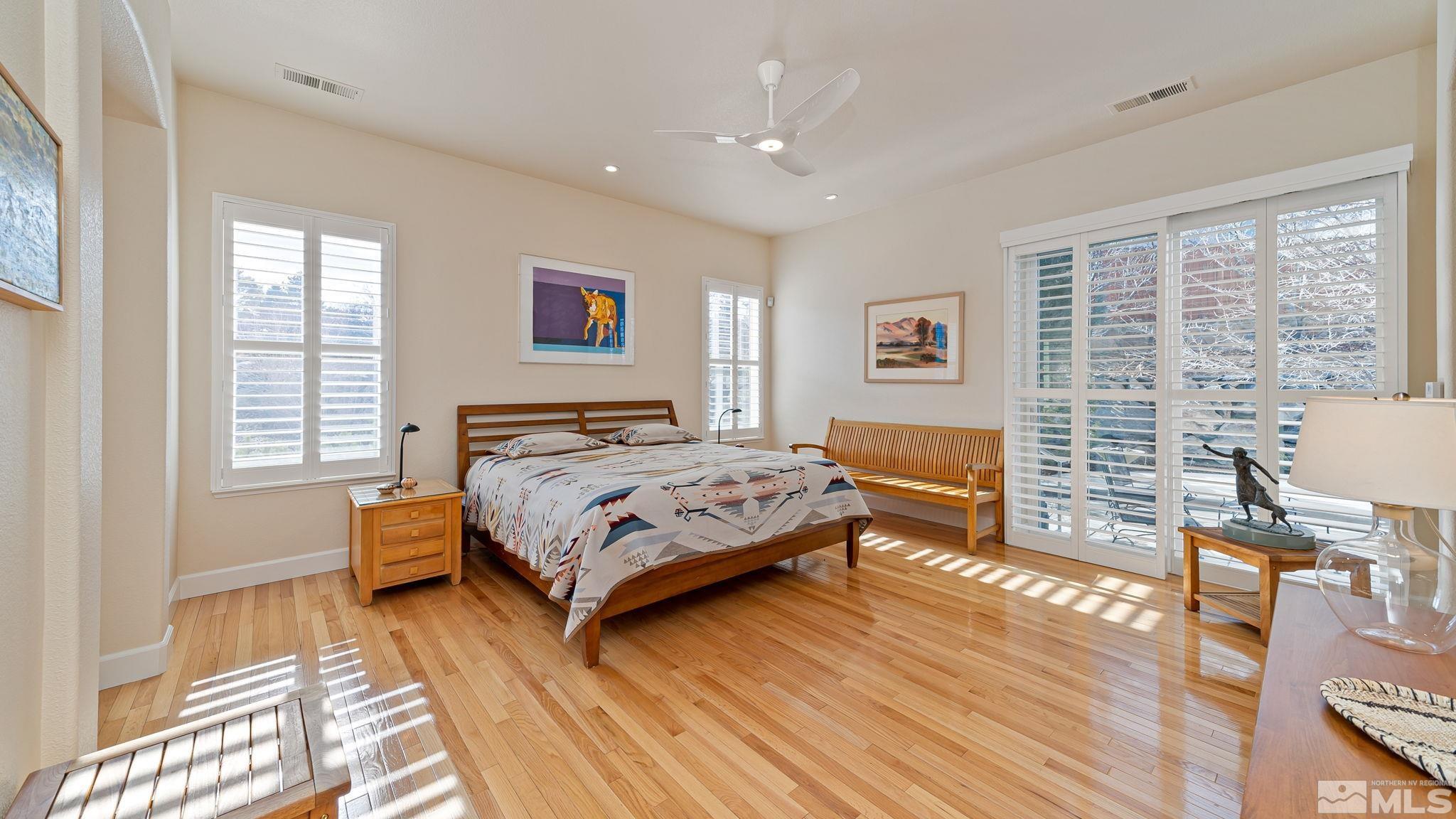 2085 Tesuque Court Reno, NV 89511 - Photo 24 of 40 a bedroom with a bed and wooden floor