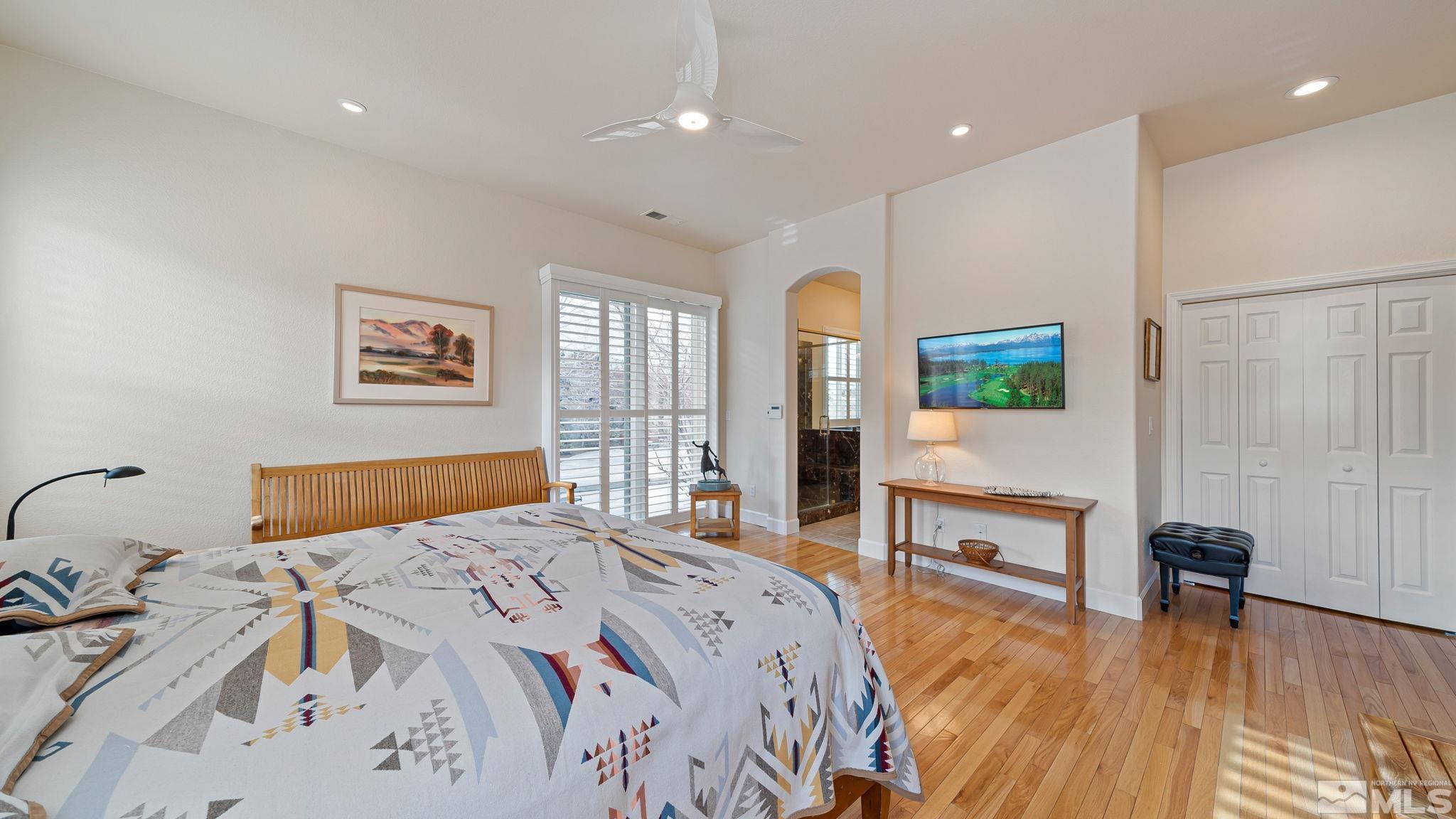 2085 Tesuque Court Reno, NV 89511 - Photo 25 of 40 a bedroom with a bed and a table in it