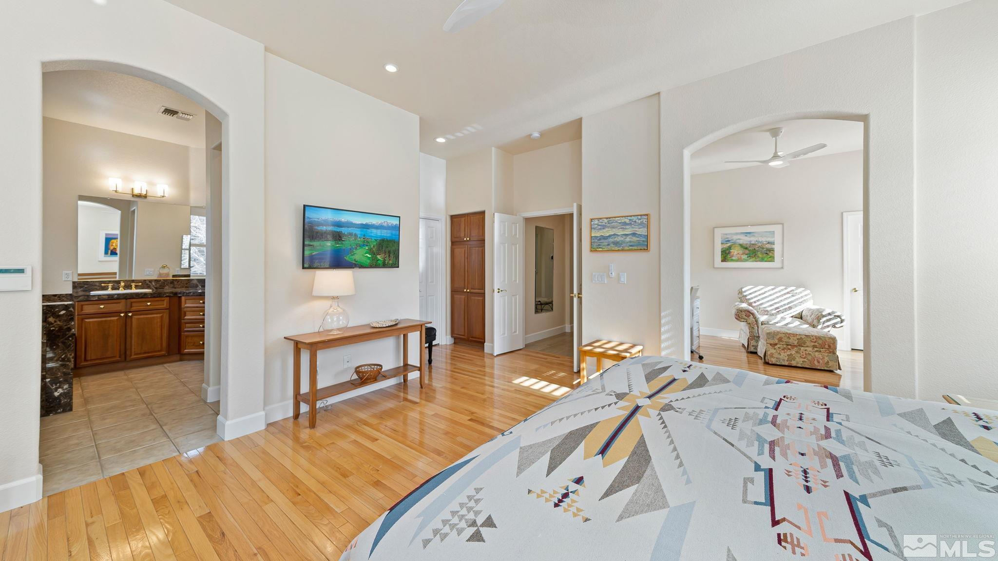 2085 Tesuque Court Reno, NV 89511 - Photo 26 of 40 a bedroom with a bed and a view of kitchen
