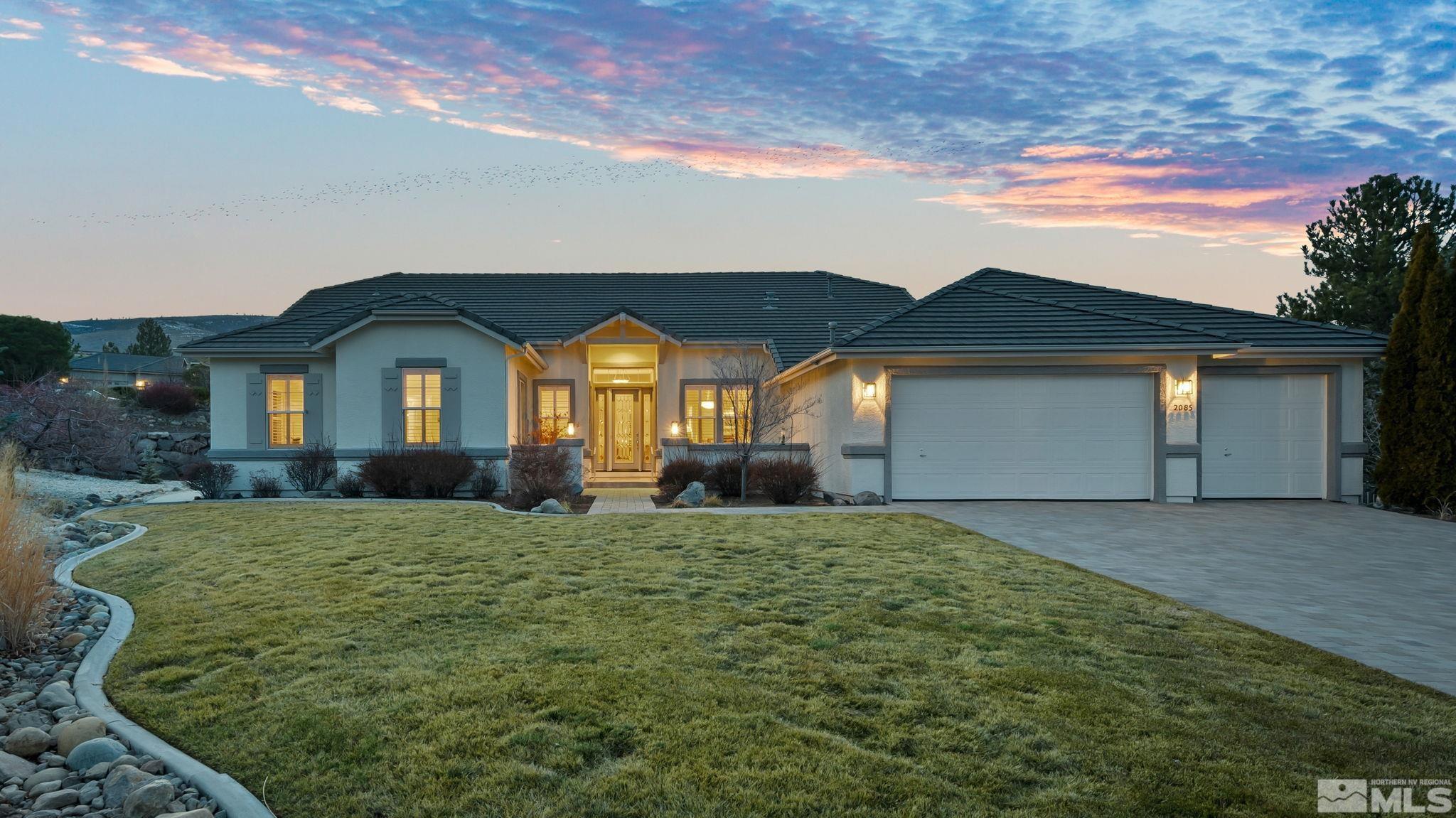 2085 Tesuque Court Reno, NV 89511 - Photo 3 of 40 a view of a house with backyard and garden