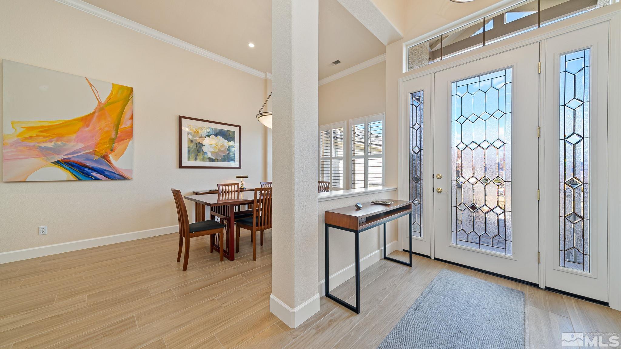 2085 Tesuque Court Reno, NV 89511 - Photo 6 of 40 a view of a livingroom with furniture window and wooden floor