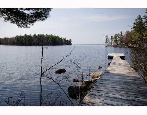 68 Acadia Road Casco, ME 04015 - Photo 1 of 17 Exterior Front. View from dock