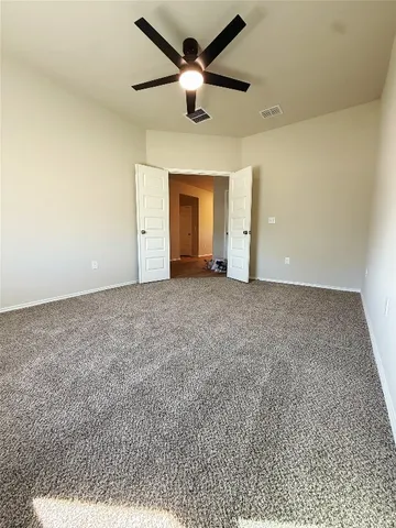 a bathroom with a sink toilet and a mirror