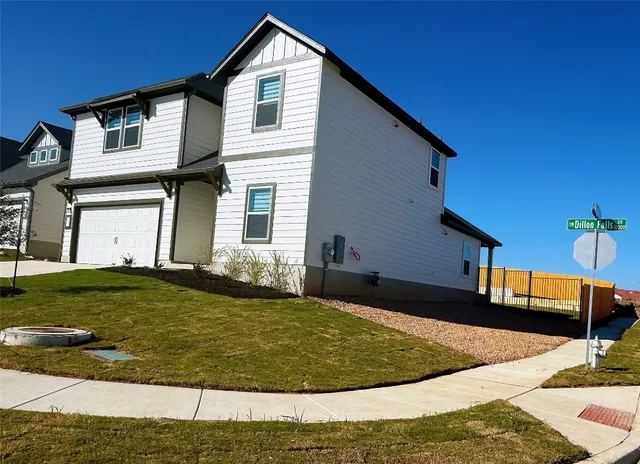 a view of a house with a swimming pool