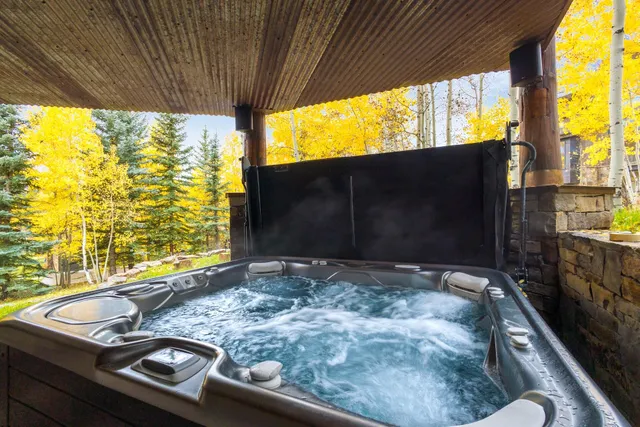 a view of a balcony with chairs