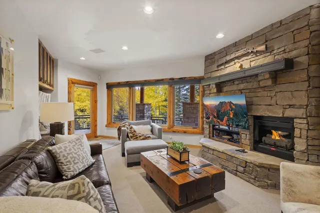 a bathroom with a tub and a window
