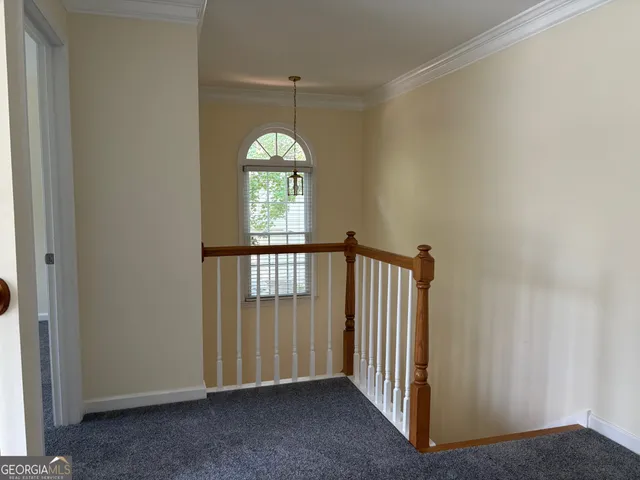 an empty room that has a window