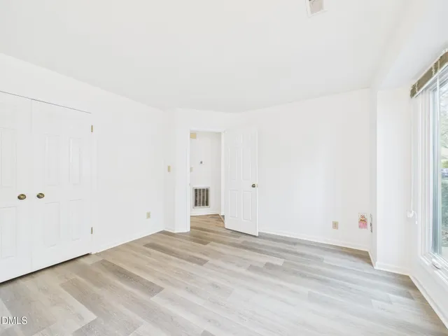 a view of a room with an empty space