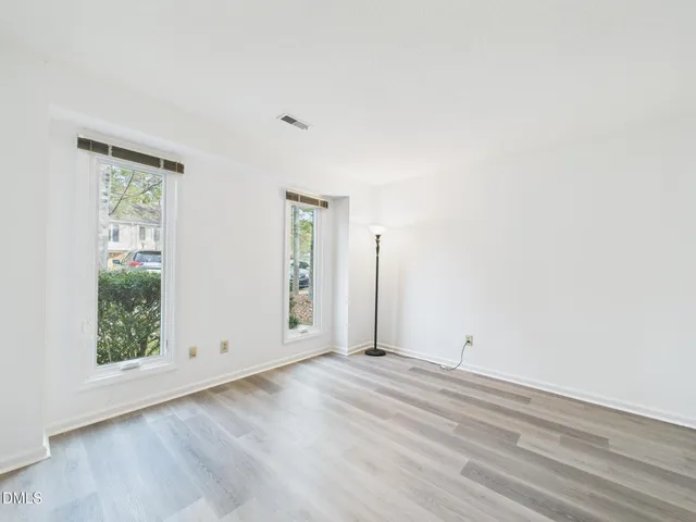 an empty room with window