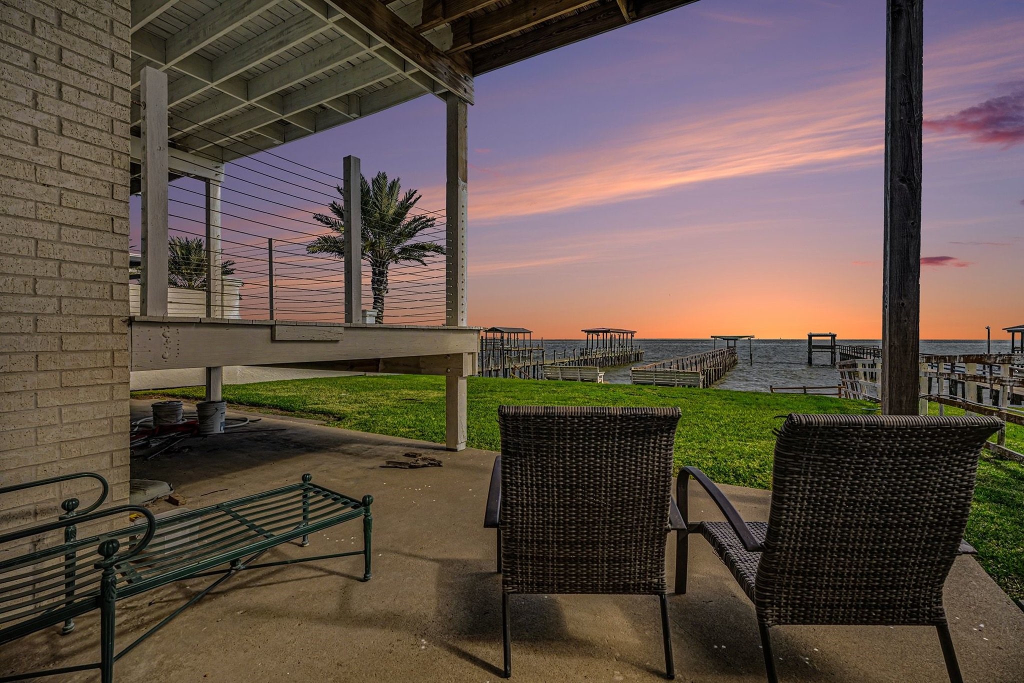 503 Bay Avenue Kemah, TX 77565 - Photo 1 of 47 a view of a patio with table and chairs and potted plants