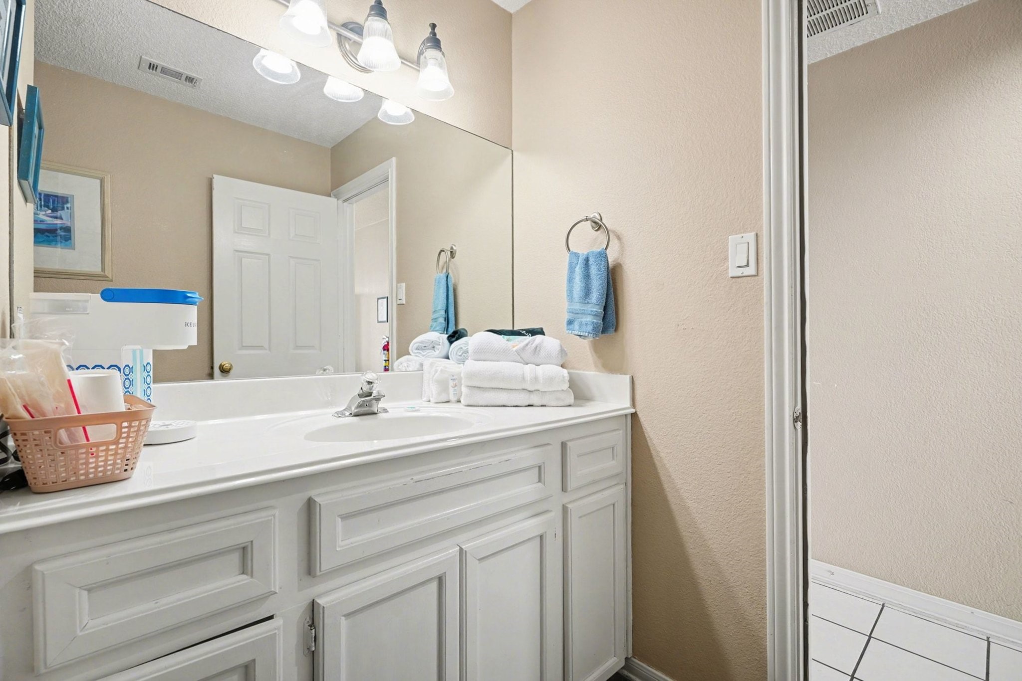 503 Bay Avenue Kemah, TX 77565 - Photo 18 of 47 a bathroom with a sink a vanity and a mirror