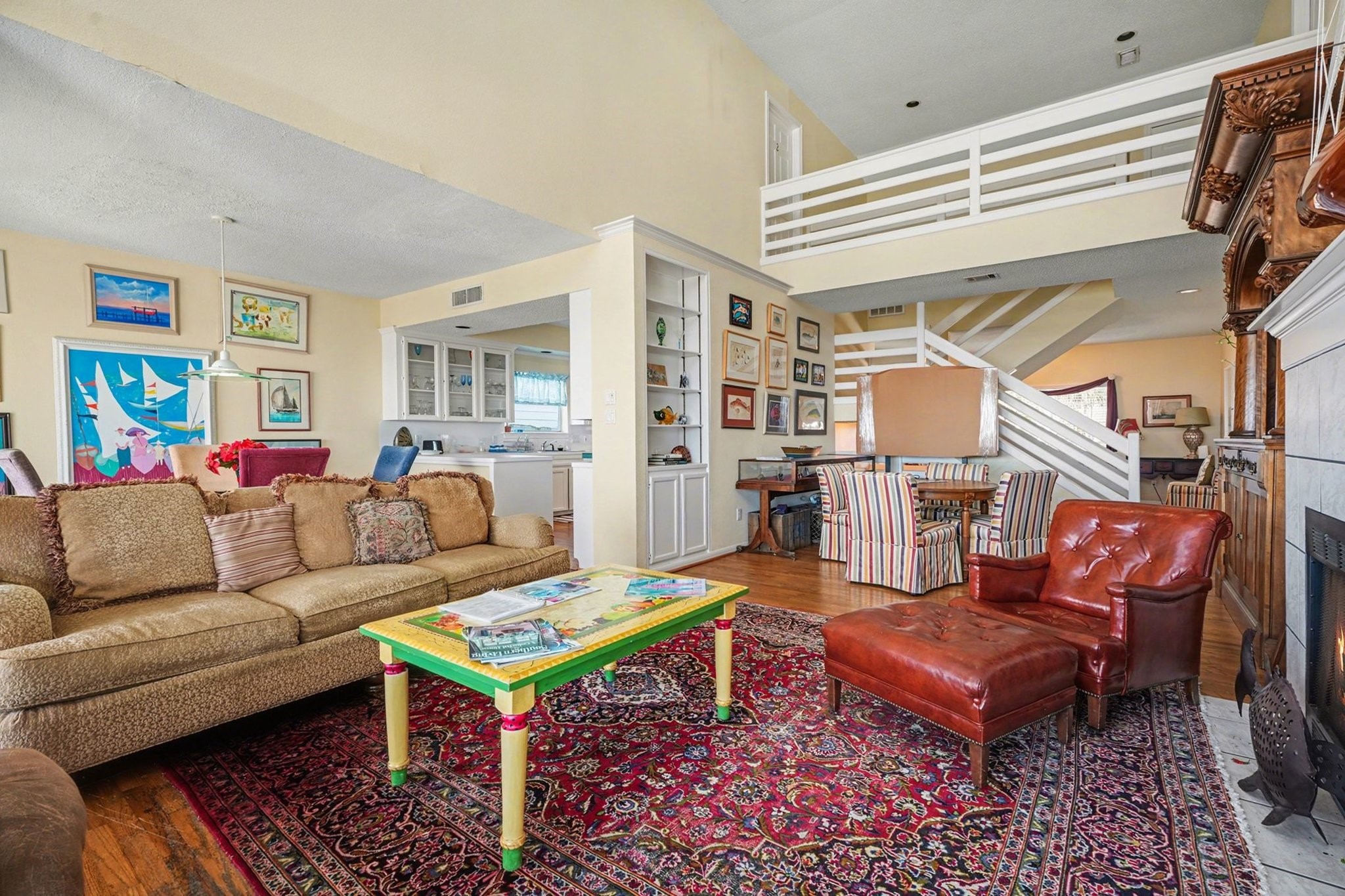 503 Bay Avenue Kemah, TX 77565 - Photo 21 of 47 a living room with furniture a table and a painting on the wall