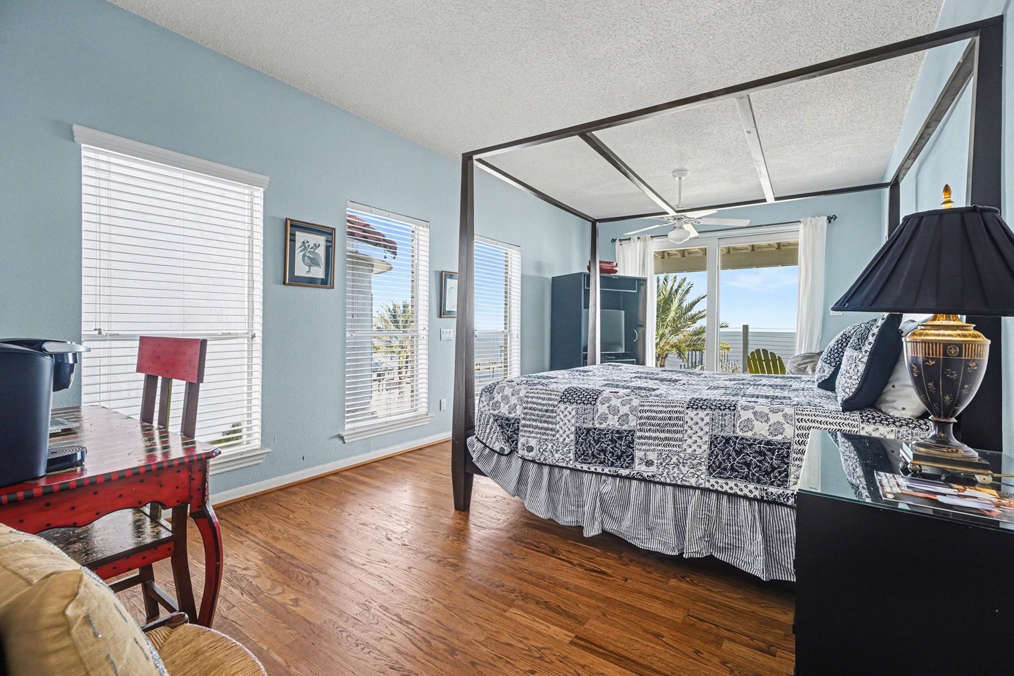 503 Bay Avenue Kemah, TX 77565 - Photo 29 of 47 a bedroom with a bed and wooden floor