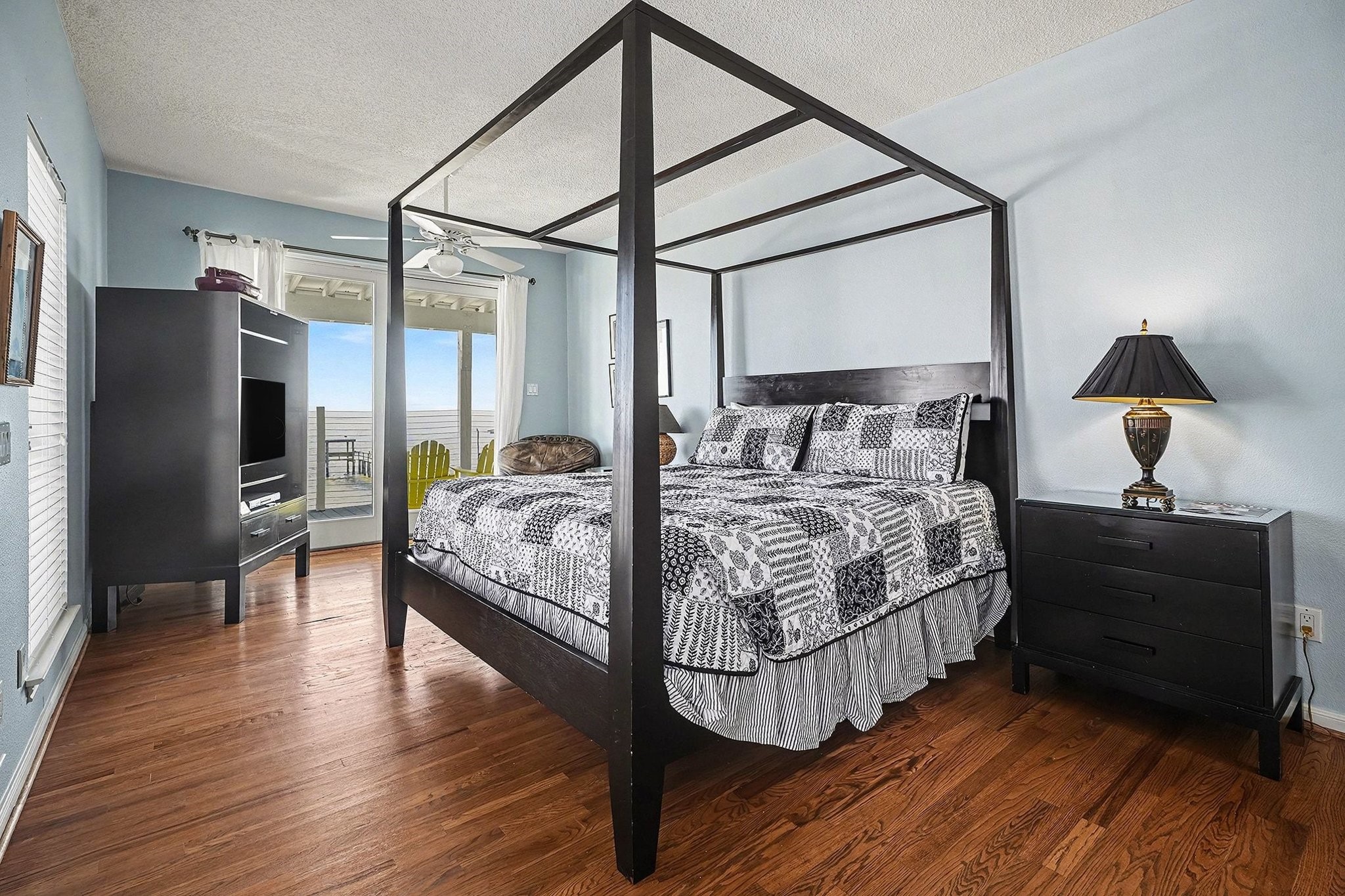 503 Bay Avenue Kemah, TX 77565 - Photo 30 of 47 a bedroom with a bed mirror and a window