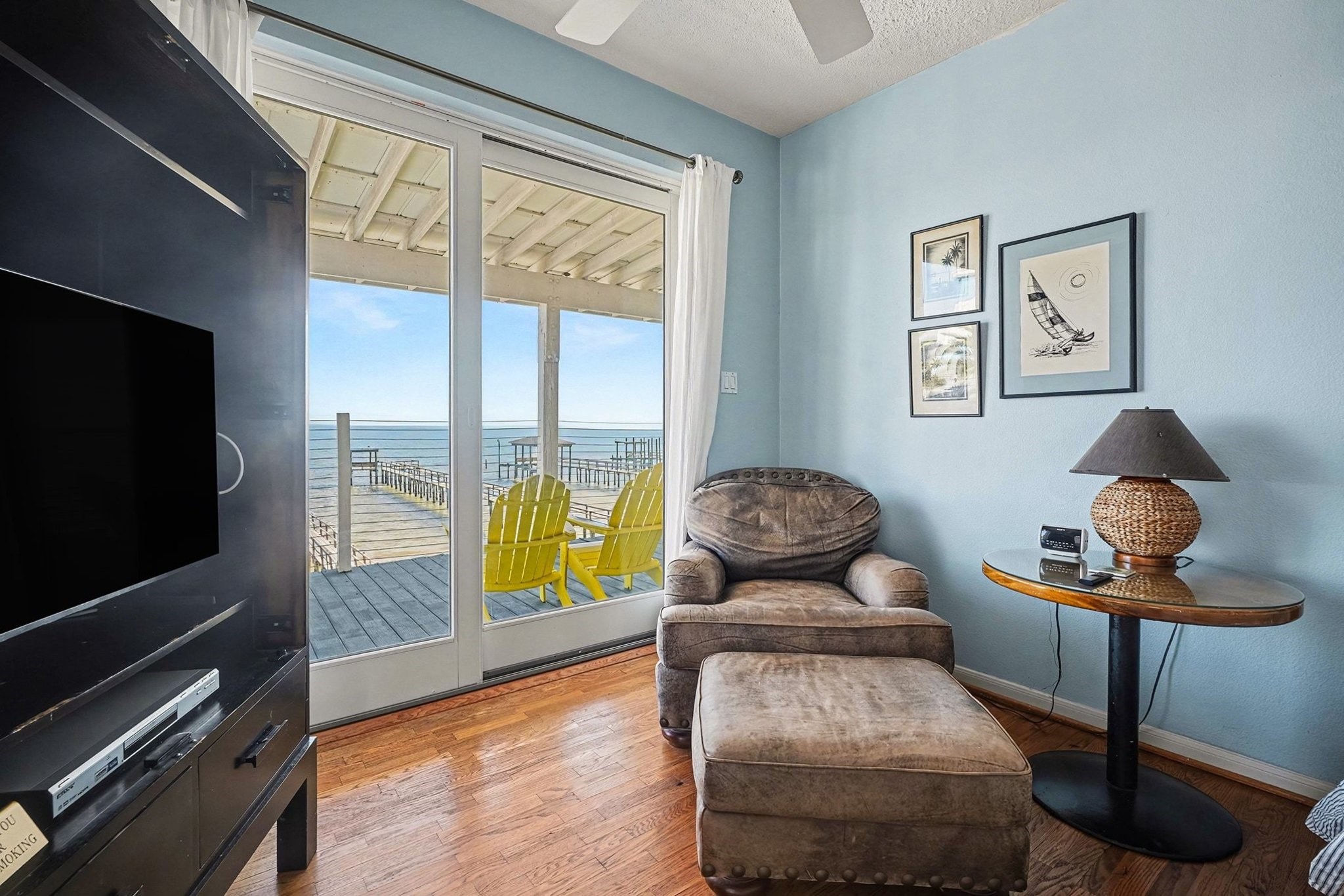 503 Bay Avenue Kemah, TX 77565 - Photo 31 of 47 a living room with furniture and a flat screen tv