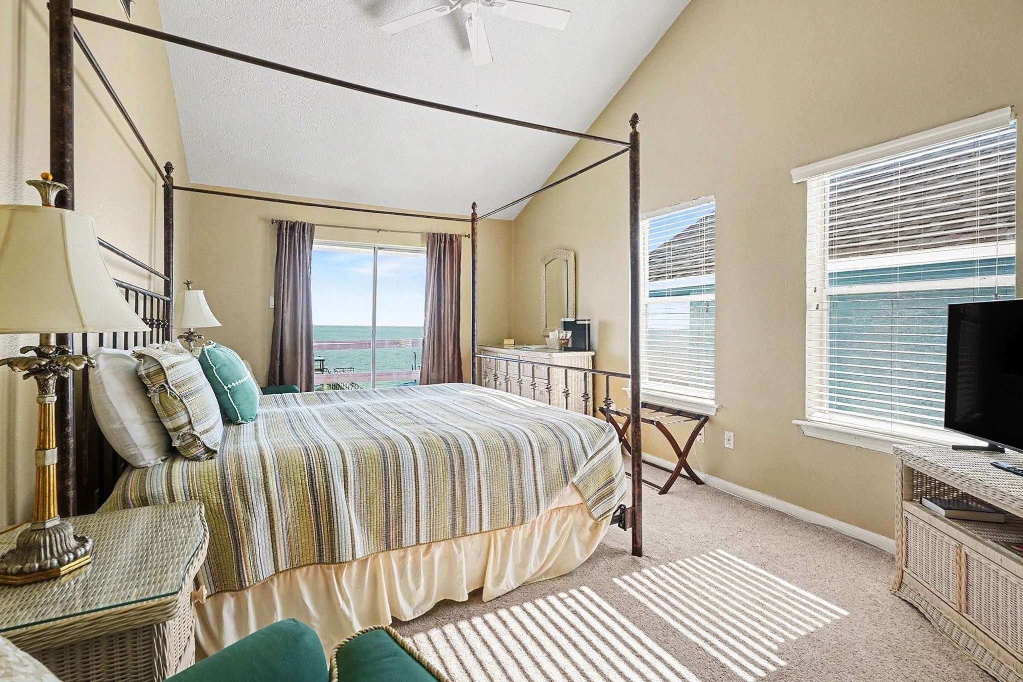 503 Bay Avenue Kemah, TX 77565 - Photo 36 of 47 a bedroom with a bed window and a flat screen tv