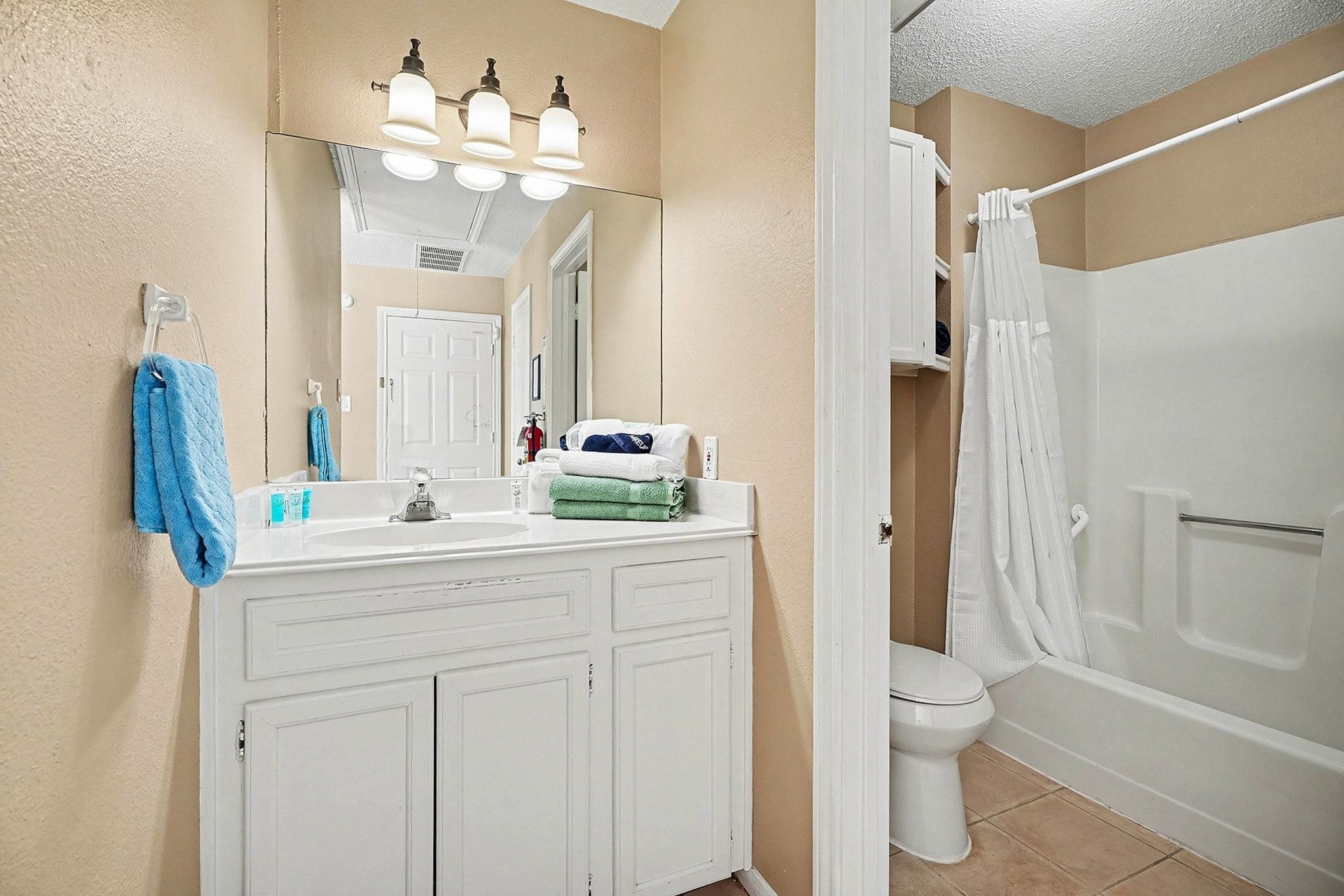 503 Bay Avenue Kemah, TX 77565 - Photo 37 of 47 a bathroom with a sink vanity mirror and toilet