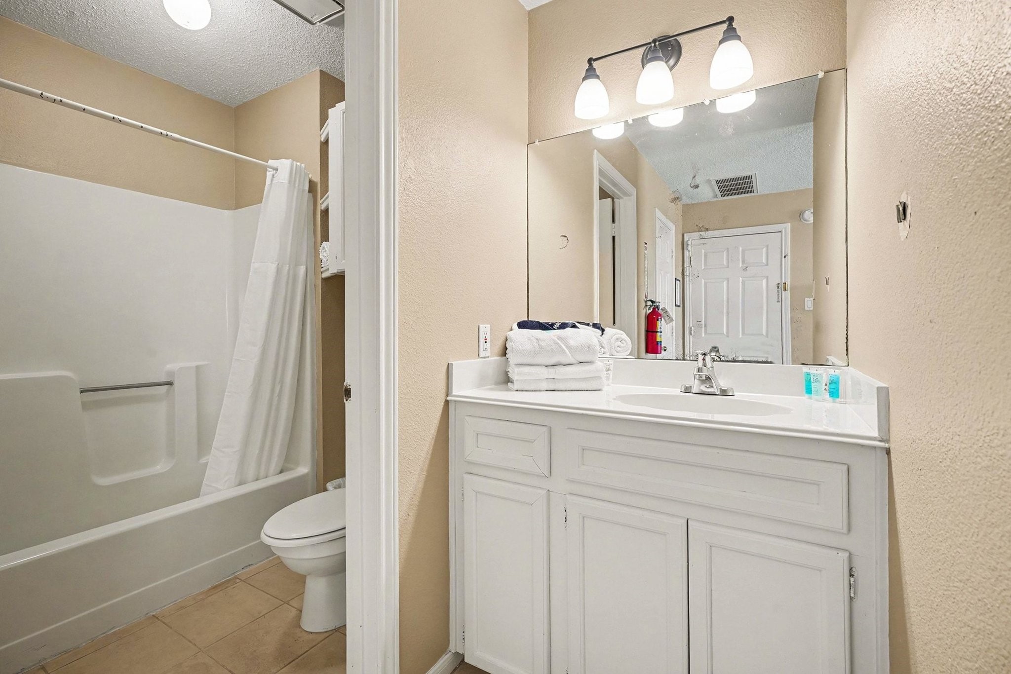 503 Bay Avenue Kemah, TX 77565 - Photo 39 of 47 a bathroom with a sink a toilet and shower