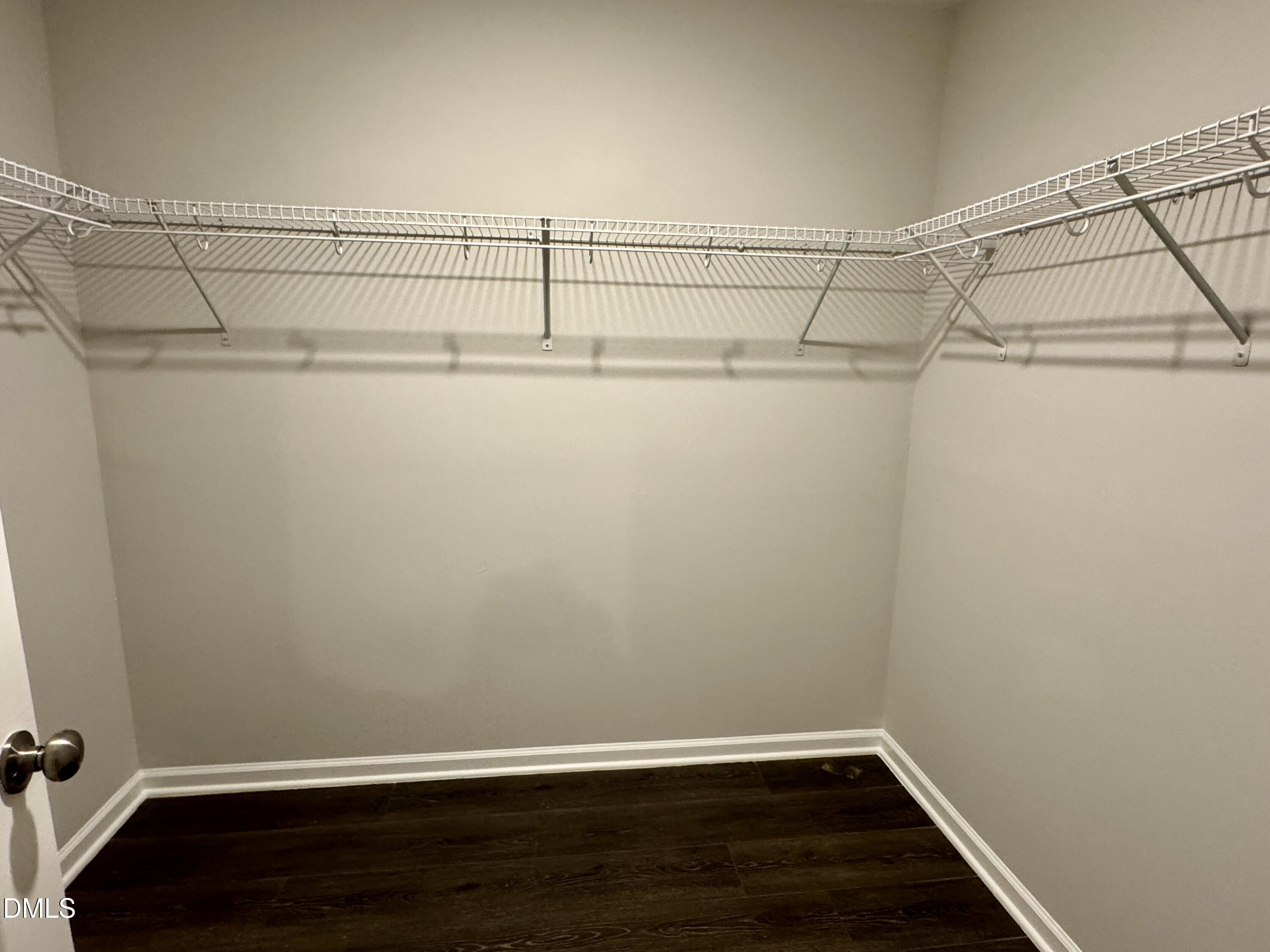 136 Durie Way Garner, NC 27529 - Photo 13 of 30 a view of a room with racks on the wall