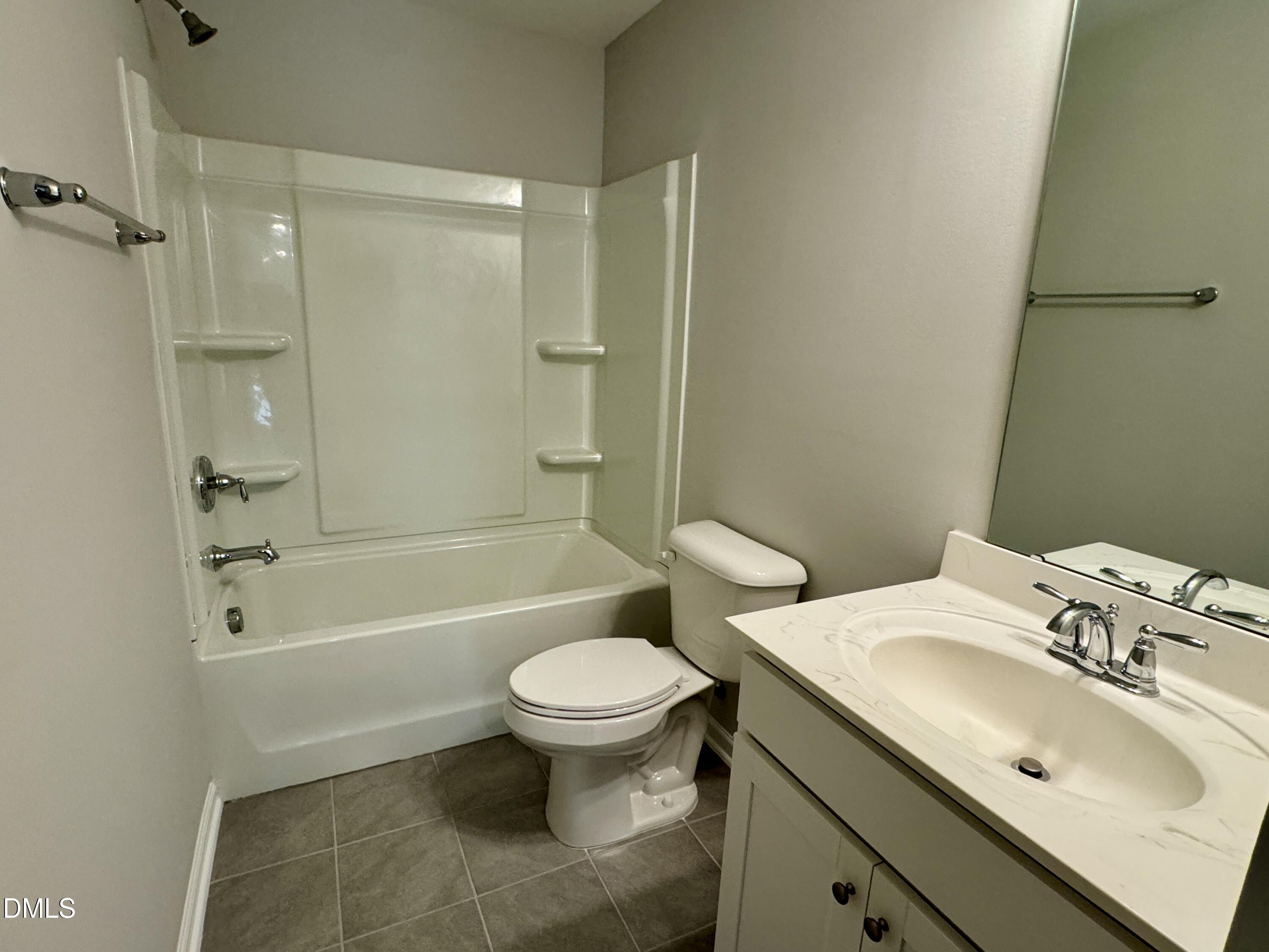136 Durie Way Garner, NC 27529 - Photo 20 of 30 a bathroom with a sink toilet and shower