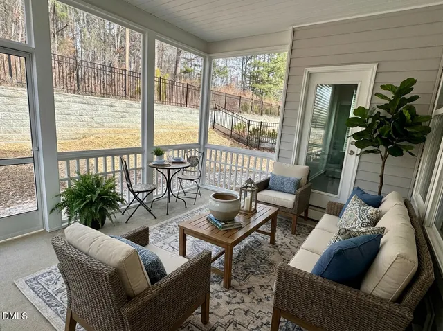 a view of a room with a large window
