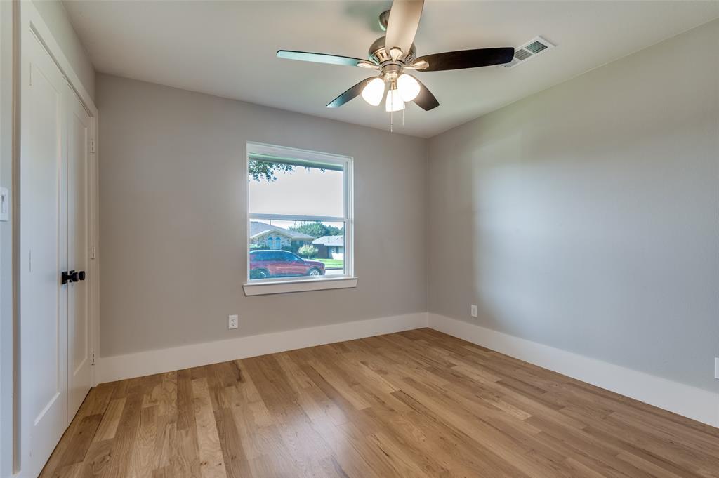 3161 Lockmoor Lane Dallas, TX 75220 - Photo 14 of 25 an empty room with a window