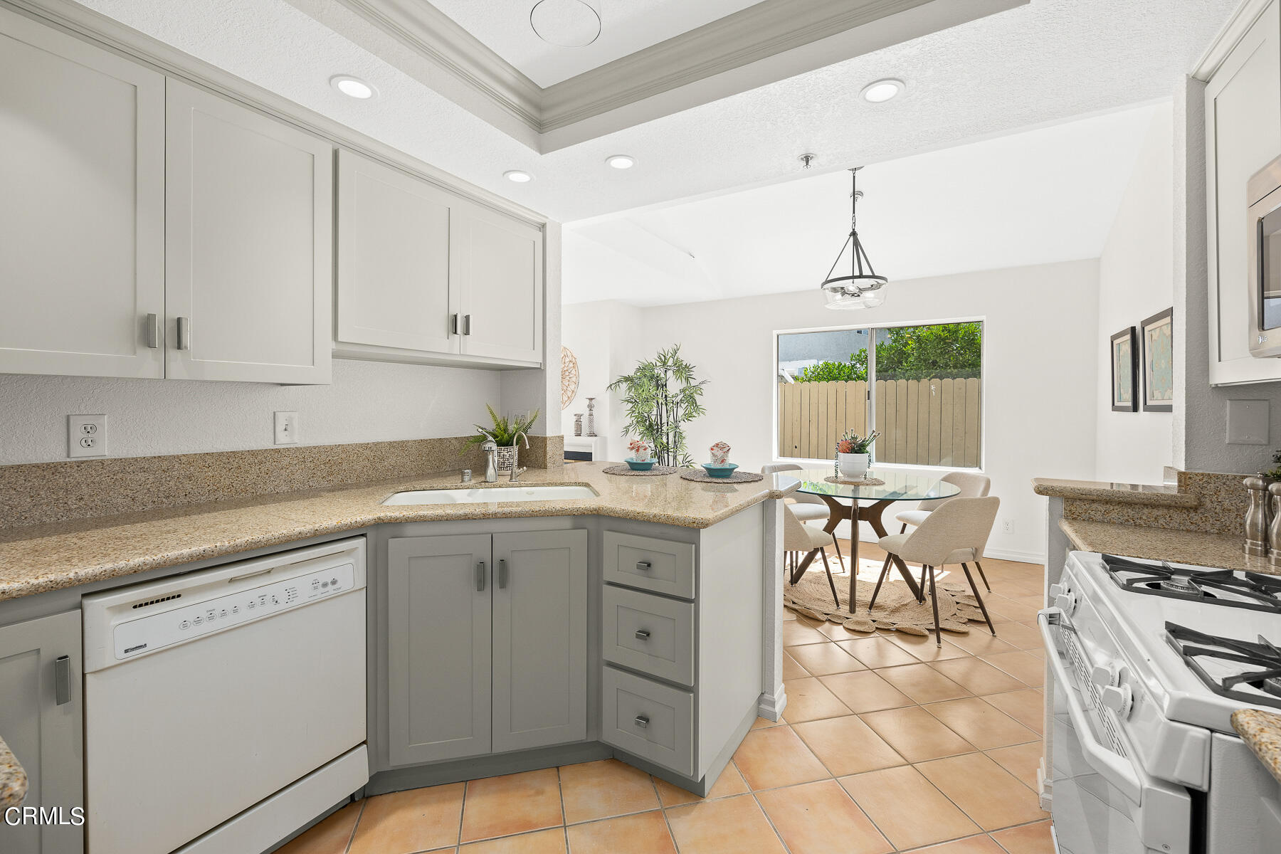 2624 Doray Circle Monrovia, CA 91016 - Photo 15 of 33 a kitchen with white cabinets and appliances