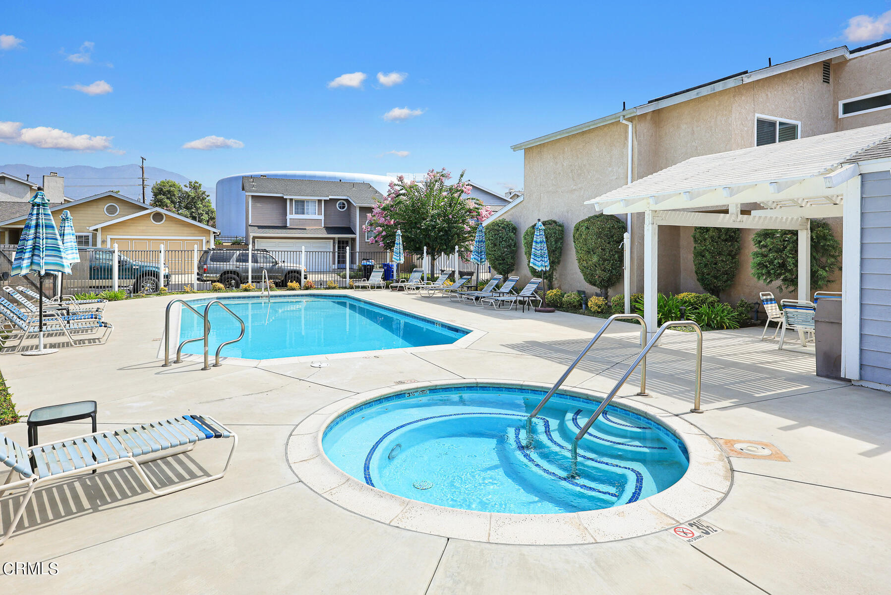 2624 Doray Circle Monrovia, CA 91016 - Photo 31 of 33 a view of a swimming pool with potted plants and palm trees