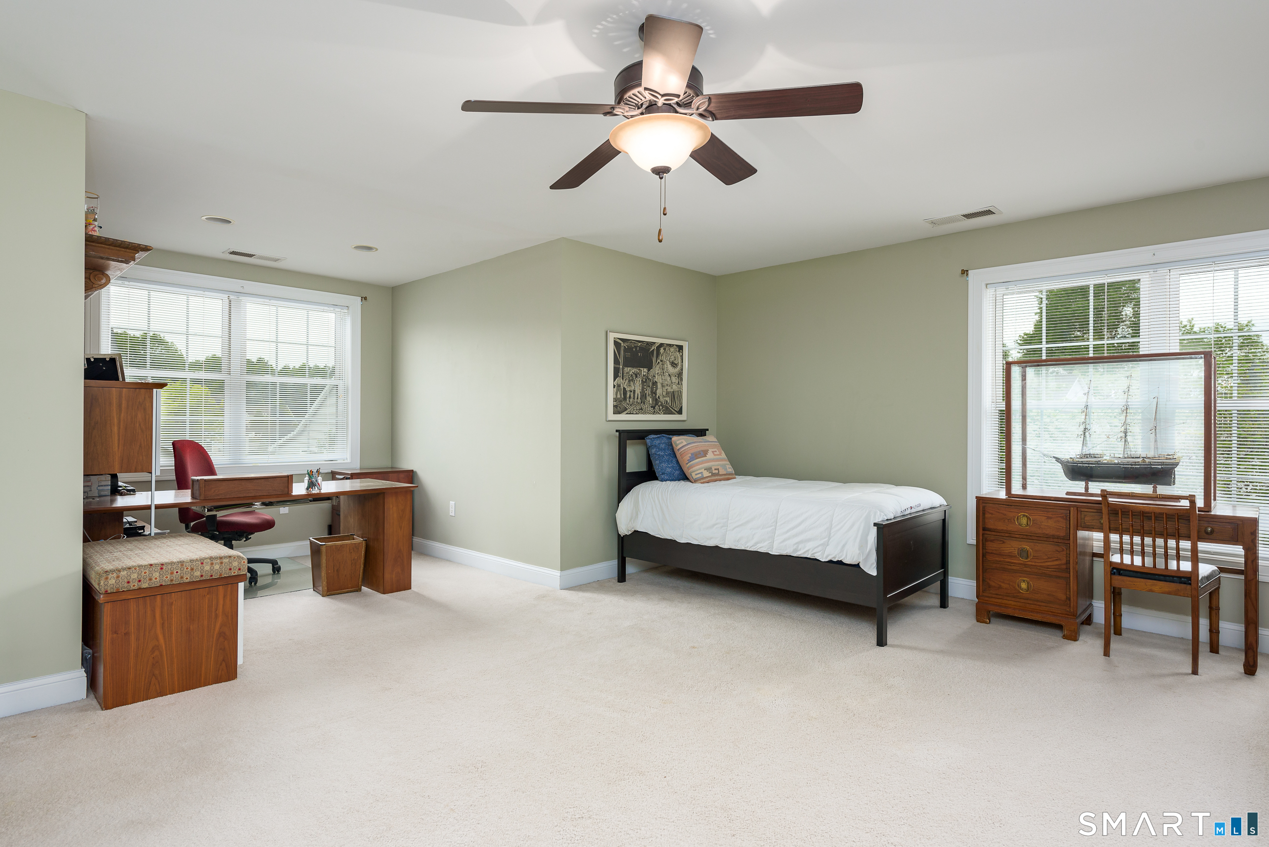 8 Greendale Drive, Unit 8 Suffield, CT 06078 - Photo 31 of 40 a bedroom with a bed work place window and furniture
