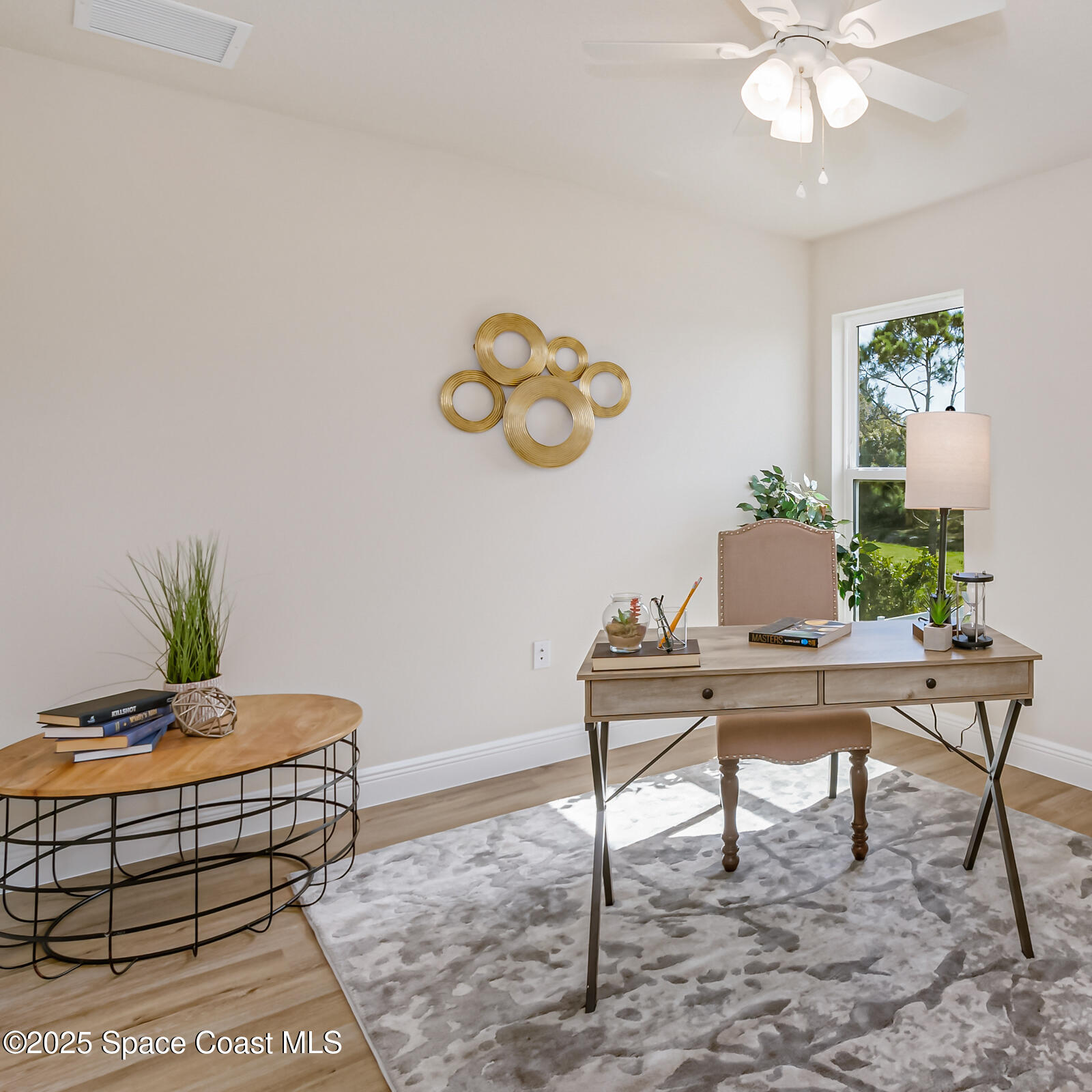 187 Hidden Woods Place Melbourne, FL 32901 - Photo 33 of 40 a workspace with furniture and window