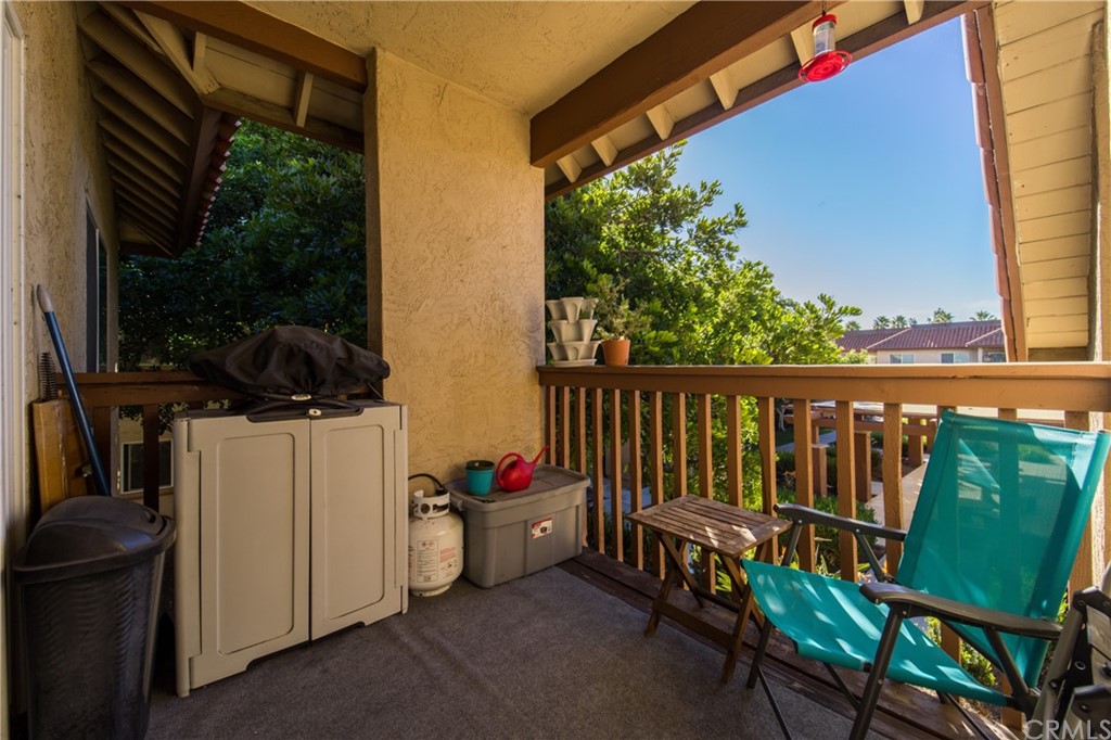 180 Chambers Street, Unit 28 El Cajon, CA 92020 - Photo 18 of 22 a view of a porch with furniture and garden