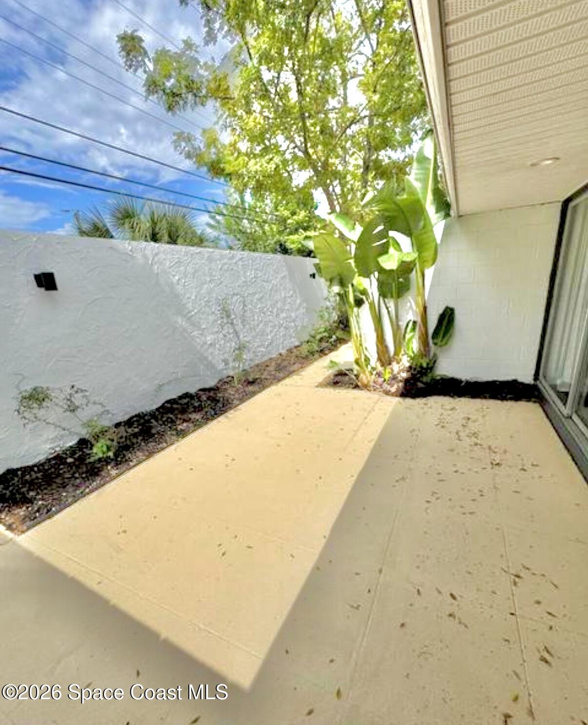 938 Brunswick Lane Rockledge, FL 32955 - Photo 20 of 21 Rear courtyard off living room