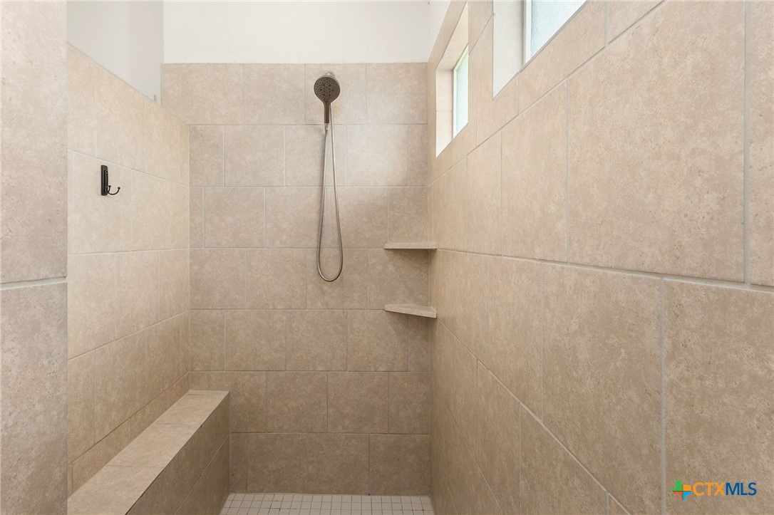 8935 Rancher Place Seguin, TX 78155 - Photo 20 of 32 master walk-in shower