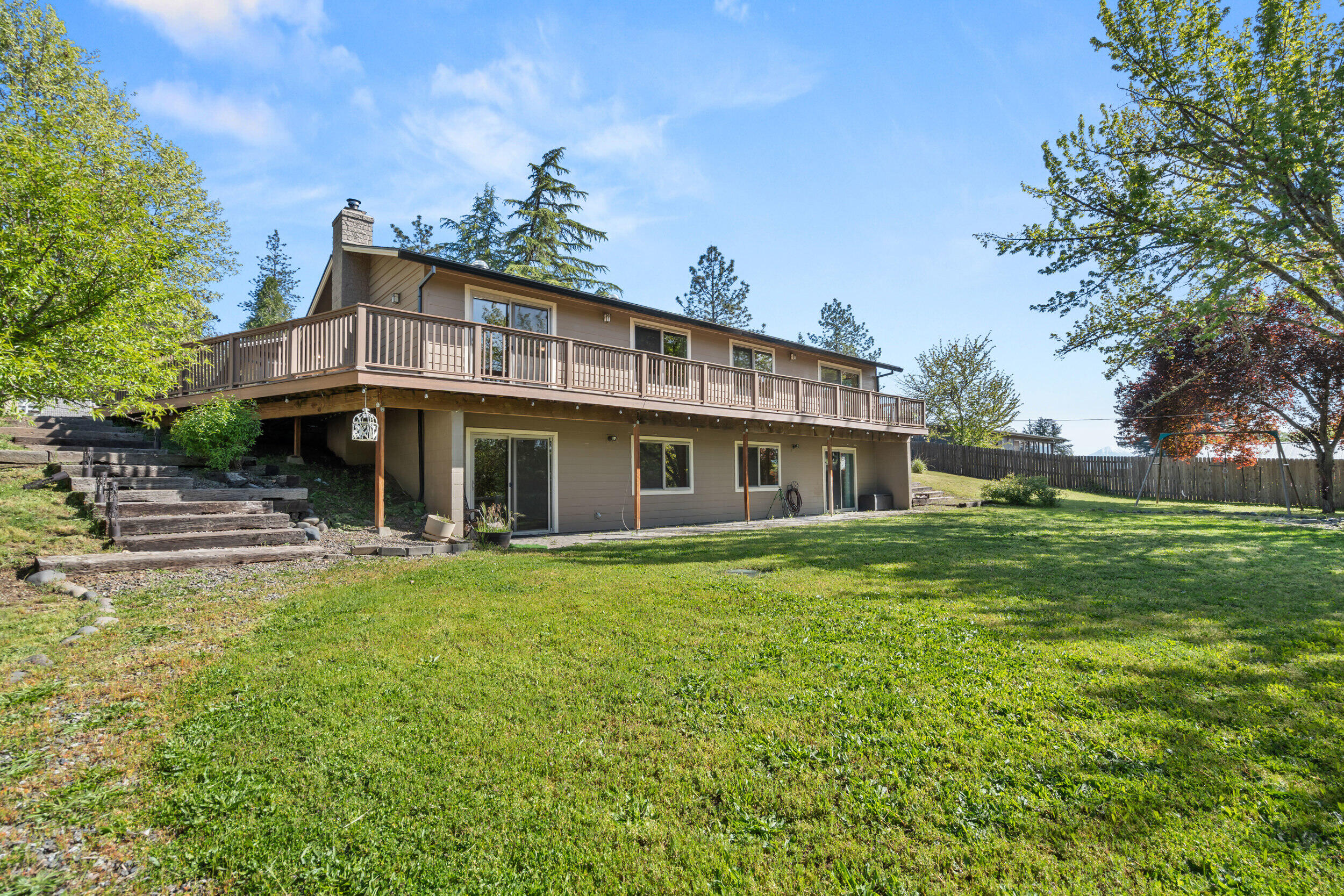 3583 Ross Lane Central Point, OR 97502 - Photo 38 of 52 a front view of a house with a garden