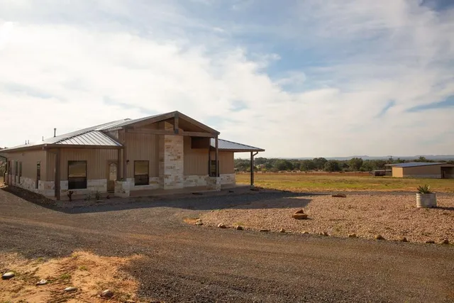 a view of a house with lake view