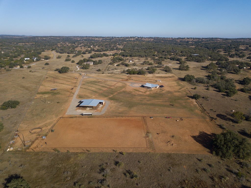 4252 Cypress Mill Road Johnson City, TX 78636 - Photo 27 of 47 an aerial view of residential houses with outdoor space