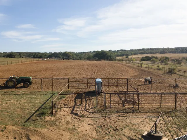 a view of a terrace with wooden floor and lake view