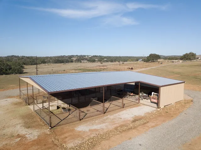 a view of a terrace with chairs and lake view