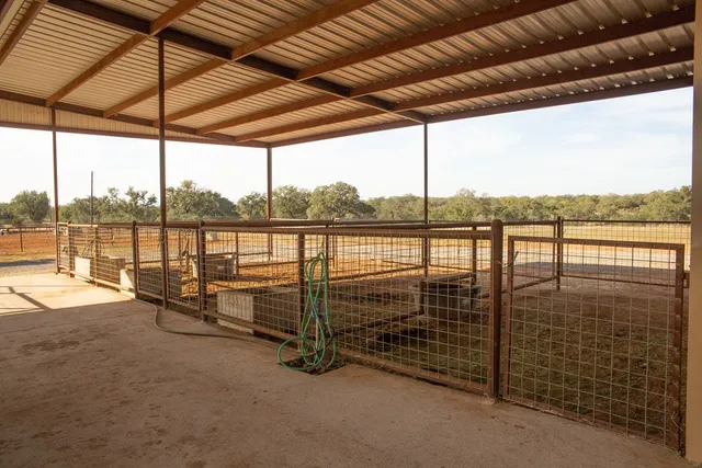 a view of swimming pool with outdoor seating