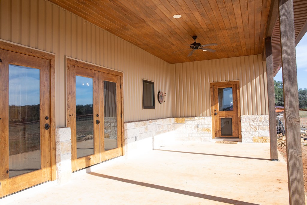 4252 Cypress Mill Road Johnson City, TX 78636 - Photo 42 of 47 a bathroom with a tub shower and mirror