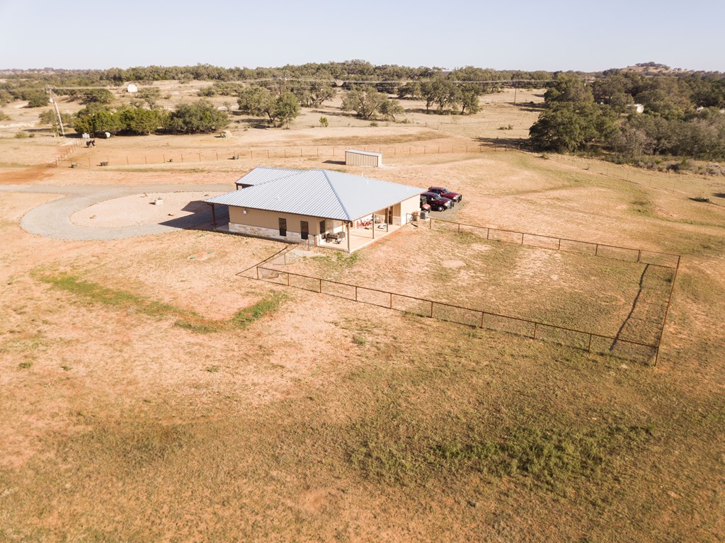 4252 Cypress Mill Road Johnson City, TX 78636 - Photo 5 of 47 a view of an ocean beach and mountain